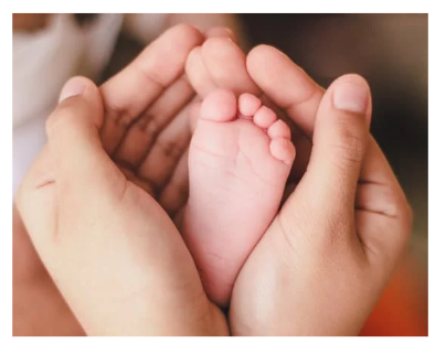 Baby and Parent holding foot