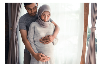 Parents holding baby bump